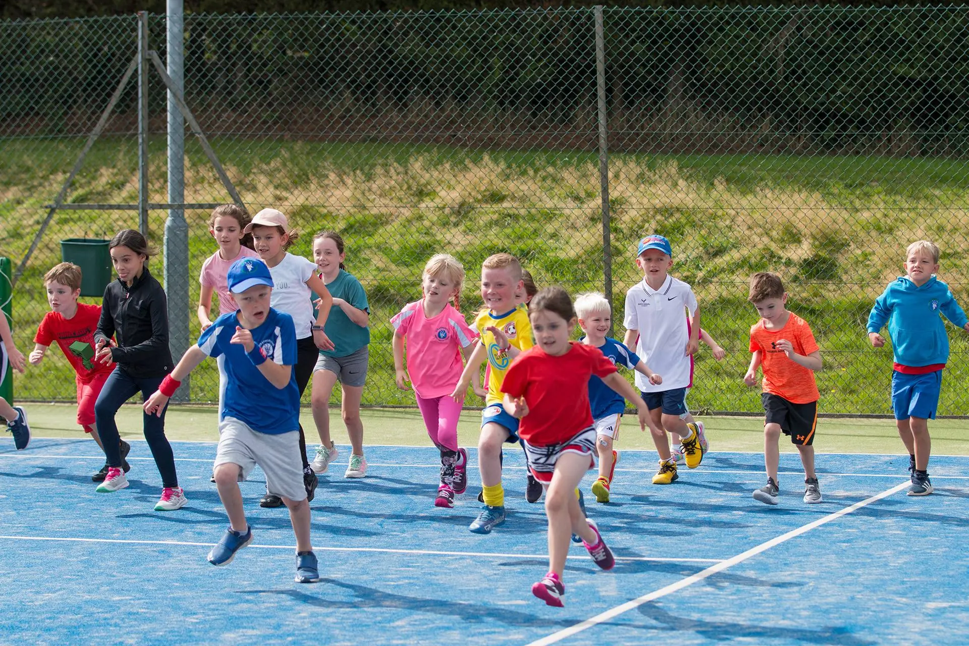 Children running drills at a Strathgryffe coaching session
